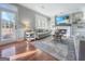 Cozy living room featuring a fireplace, built-in shelving, and lots of natural light at 407 Holly Grove Church Rd, Peachtree City, GA 30269