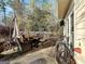 Inviting outdoor patio with comfortable seating, dining area, and a picturesque view at 407 Holly Grove Church Rd, Peachtree City, GA 30269