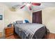 Cozy bedroom with hardwood floors, ceiling fan, and neutral tones, creating a relaxing atmosphere at 1115 Highway 54 East, Fayetteville, GA 30214