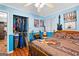 Cozy bedroom with a walk-in closet and vibrant decor and featuring natural light at 1115 Highway 54 East, Fayetteville, GA 30214