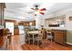 An open floor plan featuring a dining area with natural lighting and connecting kitchen space at 1115 Highway 54 East, Fayetteville, GA 30214