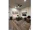 Sophisticated living room features luxury vinyl floors, modern fireplace, stylish decor, and designer rug for elegant living at 247 Ivey Ter # 45, Temple, GA 30179