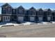 New community of townhomes featuring garage parking, craftsman style architecture, and well-manicured landscaping at 111 Meadowview Dr # 21, Temple, GA 30179