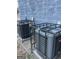Two air conditioning units surrounded by black fence at 1973 Jones Nw Ave, Atlanta, GA 30318