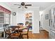 Eat-in kitchen features a wooden dining table and pantry with ample storage at 1119 Highway 54 East, Fayetteville, GA 30214