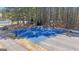 Aerial view of the community basketball court with fresh blue paint at 407 Blue Smoke Trl, Peachtree City, GA 30269