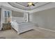 This spacious bedroom features a trey ceiling, neutral paint, carpet and lots of natural light at 407 Blue Smoke Trl, Peachtree City, GA 30269