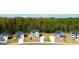 New construction community with nicely landscaped yards and mature trees at 362 Friendship Oak Way, Hampton, GA 30228