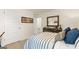 Bedroom with baseball-themed decor, dresser, mirror, and a view into the closet at 362 Friendship Oak Way, Hampton, GA 30228