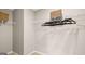 Walk-in closet with wire shelving, hanging rods, and space for storage baskets at 362 Friendship Oak Way, Hampton, GA 30228