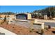 Oakchase at Hampton community entrance features brick signage, stone accents and landscaping near playground at 358 Friendship Oak Way, Hampton, GA 30228