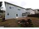 Backyard with a pond and pergola, perfect for relaxation and enjoying outdoor living in comfort at 312 Villa Place Ct, Tucker, GA 30084