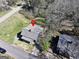 Aerial view of a charming home with a well-manicured lawn at 340 Cedar St, Social Circle, GA 30025