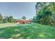Large backyard with deck featuring lots of space for outdoor activities at 677 Gum Creek Rd, Oxford, GA 30054