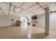 Spacious finished basement with a large TV and access to another room at 677 Gum Creek Rd, Oxford, GA 30054