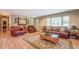 Inviting living room with large windows and neutral tones showcases a warm atmosphere at 677 Gum Creek Rd, Oxford, GA 30054