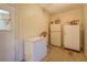 Utility room with chest freezer and two refrigerators at 677 Gum Creek Rd, Oxford, GA 30054