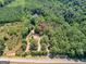 Extensive acreage with this listing, including mature trees and open fields at 2643 Rocky Creek Rd, Hampton, GA 30228