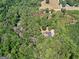 Aerial view of house in the woods at 2643 Rocky Creek Rd, Hampton, GA 30228