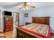 Spacious bedroom with a large bed and matching wooden furniture, providing ample storage at 2643 Rocky Creek Rd, Hampton, GA 30228