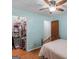 Bedroom with walk-in closet and view to a bright, adjacent room at 2643 Rocky Creek Rd, Hampton, GA 30228