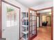 The entryway has natural light, storage, and a glimpse into the home's interior at 2643 Rocky Creek Rd, Hampton, GA 30228