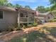 Home with a covered porch and American flag flying at 2643 Rocky Creek Rd, Hampton, GA 30228