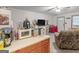 Living room with a snack prep area with coffee and microwave at 2643 Rocky Creek Rd, Hampton, GA 30228