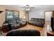 A cozy living room with natural light and laminate floors at 2643 Rocky Creek Rd, Hampton, GA 30228