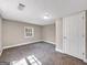 Cozy bedroom featuring neutral walls, carpet flooring, and a bright window allowing natural light at 927 Dean Patrick Rd, Locust Grove, GA 30248