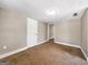 Bedroom featuring a neutral color scheme and a textured ceiling at 927 Dean Patrick Rd, Locust Grove, GA 30248
