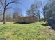 Back view of home with fenced yard at 927 Dean Patrick Rd, Locust Grove, GA 30248