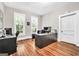 Inviting office with hardwood floors, natural light from two windows and ample desk space at 76 College St, Mcdonough, GA 30253