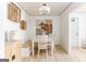 Dining area with a table, chairs, and a storage cabinet at 3529 Essex Ave # 75, Atlanta, GA 30339