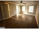 Large main bedroom with natural light, neutral walls, and fan at 215 Buck Run, Loganville, GA 30052