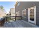 Wooden deck with a view of neighboring homes at 7754 Hansel Ln, Lithonia, GA 30058