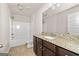 Bathroom featuring granite countertops and a bathtub with shower at 7754 Hansel Ln, Lithonia, GA 30058