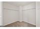 Walk-in closet with carpeted floors and shelving for organizing clothing and accessories at 7754 Hansel Ln, Lithonia, GA 30058