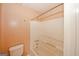 Bathroom with a shower-tub combo and a white toilet, showcasing functional design at 4161 Windermere Dr, Lithonia, GA 30038
