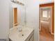 Bathroom features a vanity with white countertops and a large mirror above the sink at 4161 Windermere Dr, Lithonia, GA 30038