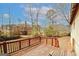 Outdoor deck area overlooking mature trees and neighboring brick homes, providing a serene setting at 4161 Windermere Dr, Lithonia, GA 30038