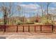 Wooden deck provides outdoor space with views of neighboring houses at 4161 Windermere Dr, Lithonia, GA 30038