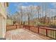 Outdoor deck with wooded views and adjacent homes, offering privacy and tranquility at 4161 Windermere Dr, Lithonia, GA 30038