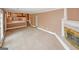 Open living space featuring fireplace, kitchen view, and ample natural light at 4161 Windermere Dr, Lithonia, GA 30038