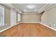 Finished basement with hardwood floors, crown molding and built in storage at 1654 Summersweet Ln, Dacula, GA 30019