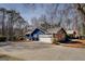 Attractive home featuring a two-car garage and stone accents at 825 Sugar Creek Se Way, Conyers, GA 30094