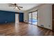 Living room with wood-look floors and access to the pool at 825 Sugar Creek Se Way, Conyers, GA 30094