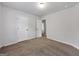 Bedroom featuring neutral paint, carpet and door at 789 Galveston Way, Mcdonough, GA 30253