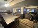 The spacious basement features a game area and living room with comfortable sectional sofas at 848 Still Rd, Lawrenceville, GA 30045