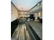 Finished basement including a bar, countertops, table, chairs, and wood-look flooring at 848 Still Rd, Lawrenceville, GA 30045